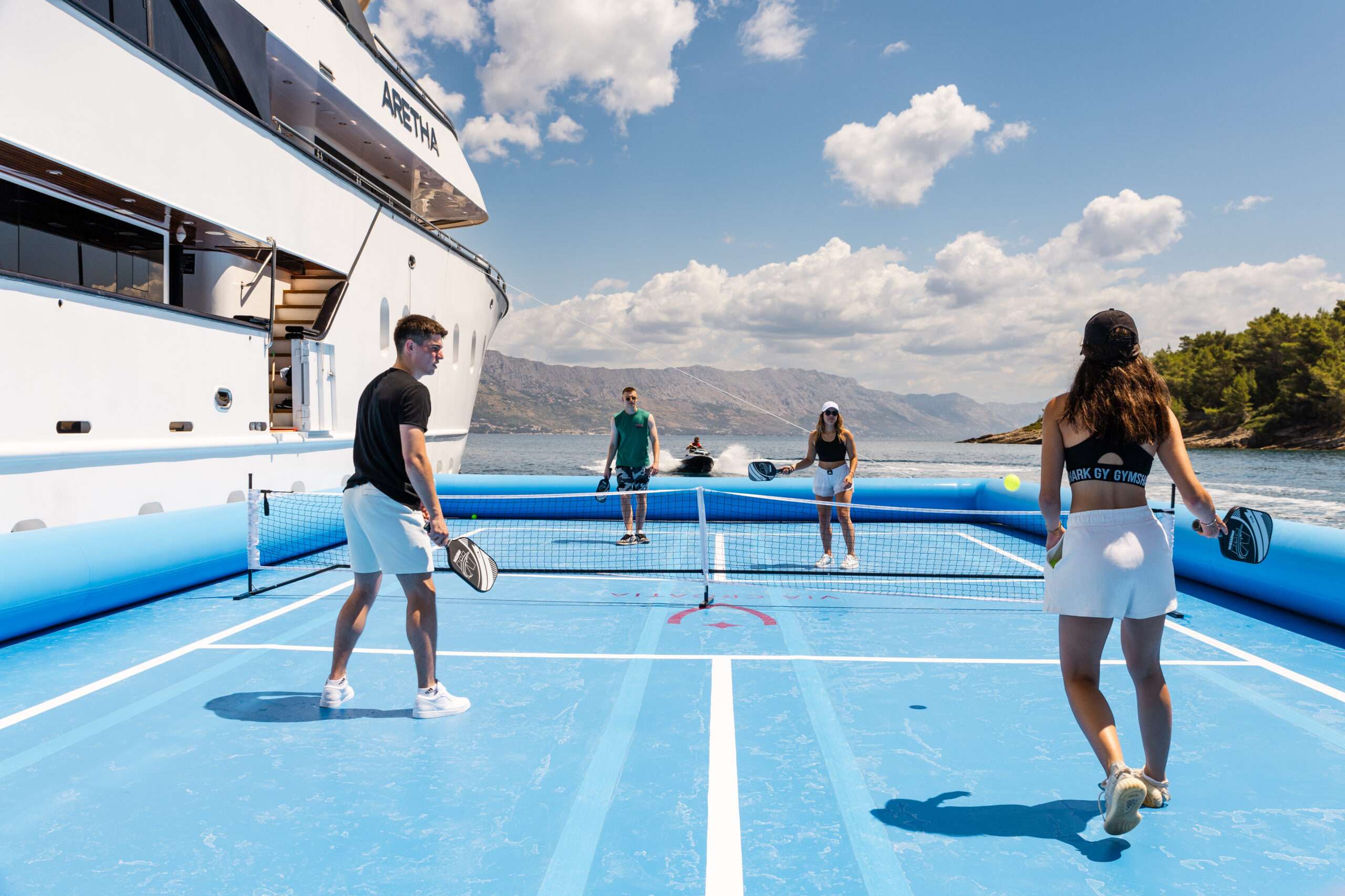 Charter ARETHA luxury yacht in Croatia floating pool behind yacht.
