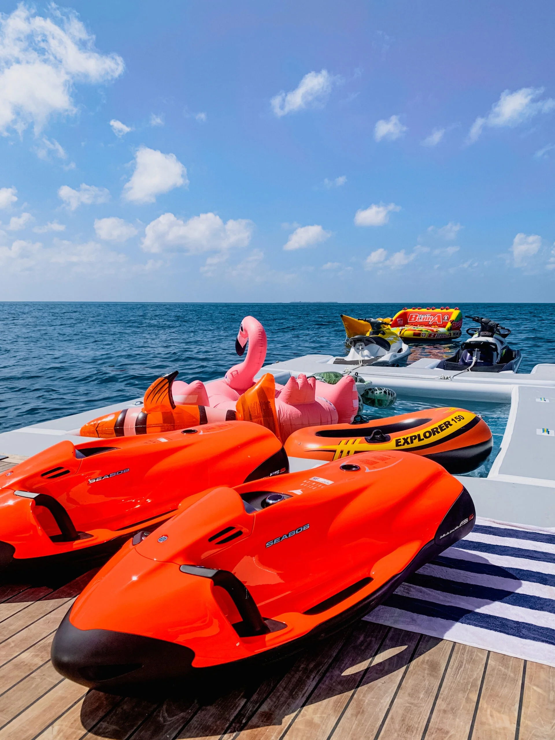 Jet skis and seabobs on the swim platform of ARK NOBLE.
