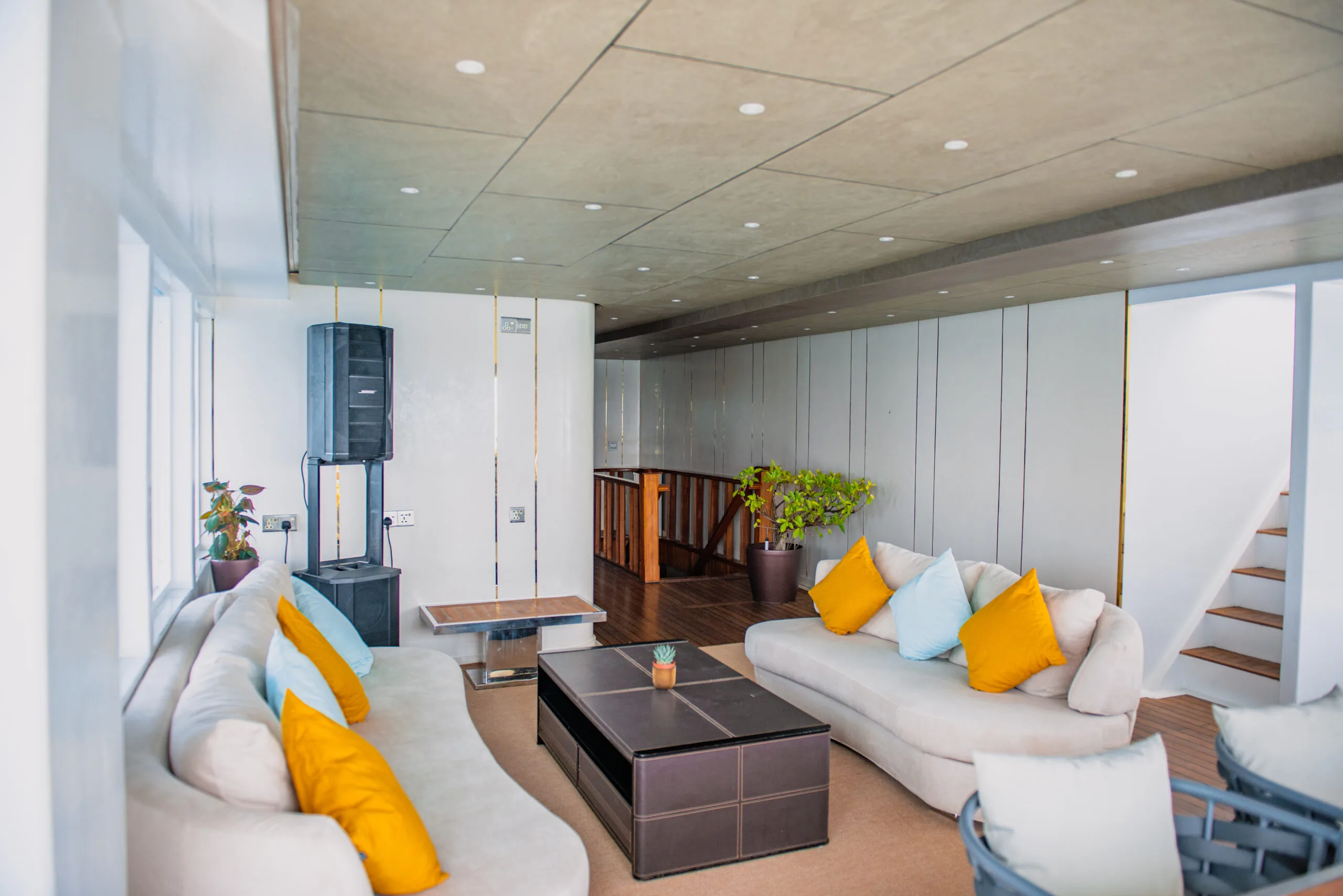 Modern main salon lounge onboard ARK NOBLE in the Maldives.
