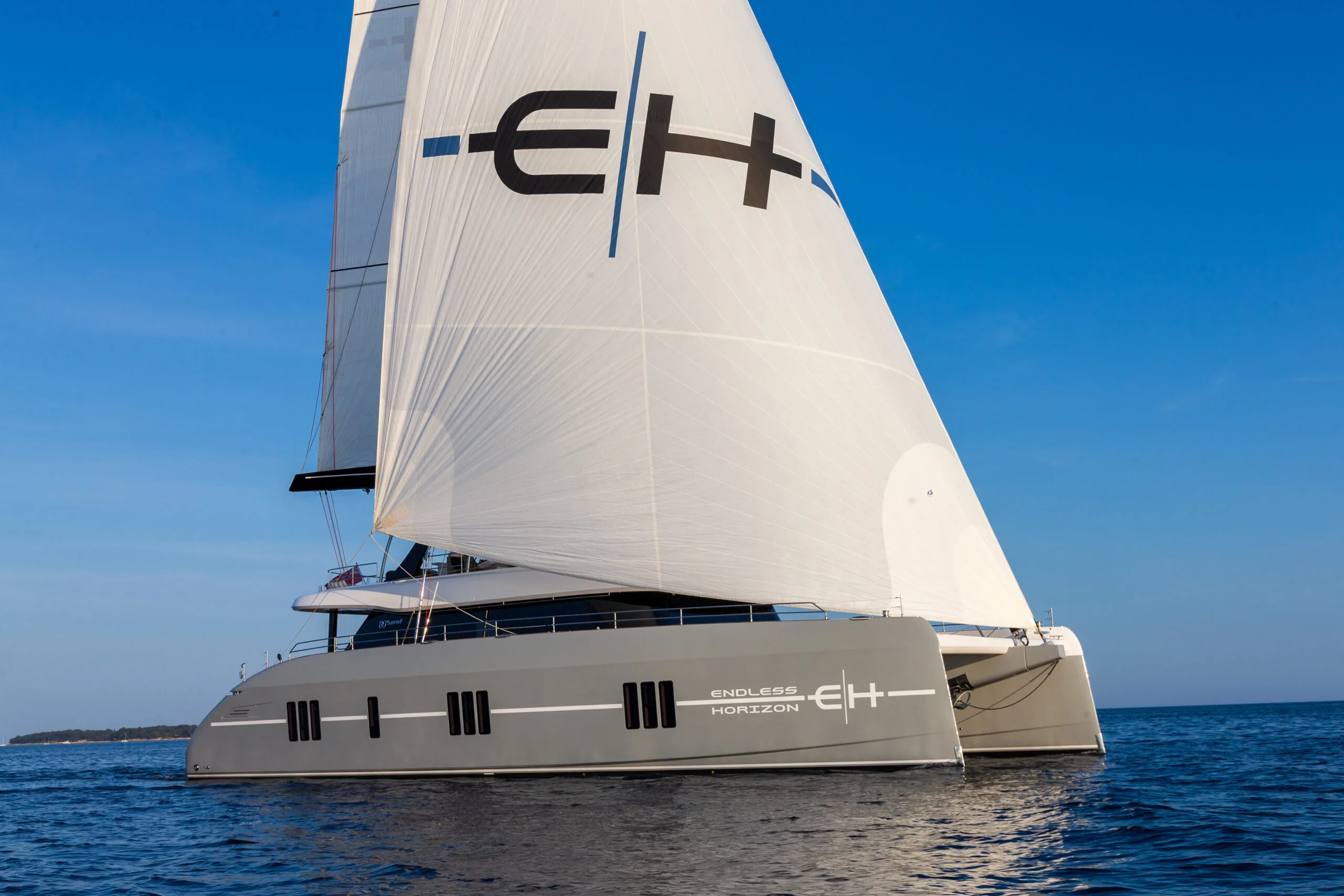 EH-branded sail of ENDLESS HORIZON Sunreef 80 in the Caribbean.